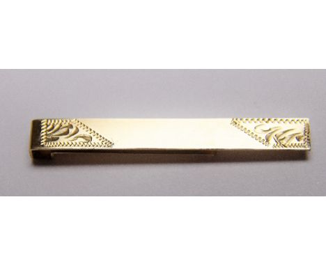 GENTS TIE CLIP. 9 ct yellow gold gents tie clip CONDITION REPORT: The weight of this item is approximately 1.96g