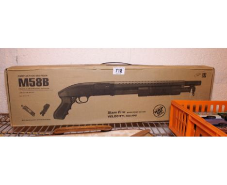 BB GUN. Pump action M58B shotgun air soft BB gun with ammunition