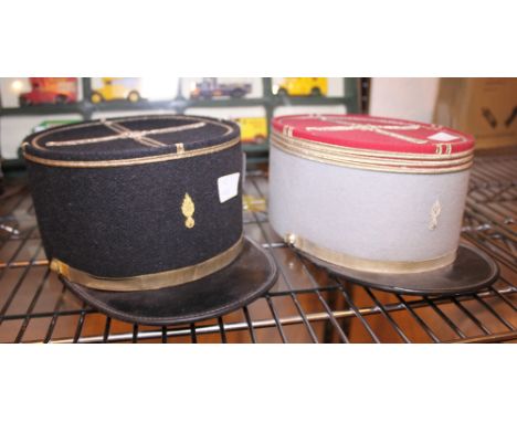 LEGION KEPI. Two French army issue legion Kepi