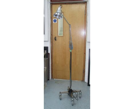 ANGLEPOISE FLOOR LAMP, by Herbert Terry and Sons, mid 20th century on weighted base with castors, 145cm H. (with faults)