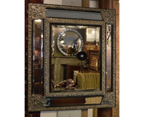 WALL MIRROR, 19th century Dutch repousse silvered, of cushion form with bevelled and marginal plates, 85cm W x 98cm H.