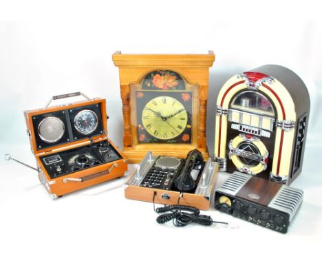 SPIRIT OF ST LOUIS; a reproduction hands free telephone, 'Rock 'n Roll Radio' jukebox and two radio alarm clocks, also a furt