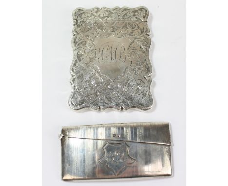 WILLIAM HAIR HASELER; an Edward VII&nbsp;hallmarked silver card case of shaped rectangular form with engraved foliate decorat