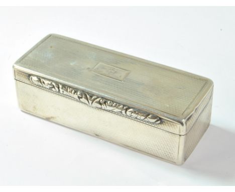 A William IV hallmarked silver snuff box of rectangular form with overall engine turned decoration and cast foliate scroll th