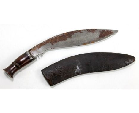 A military issue kukri with broad arrow stamp to blade back and further stamped '[...] Singh &amp; Sons Rawalpindi', blade le