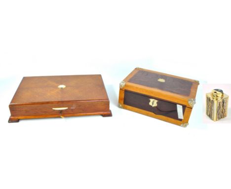 A 20th century and later cutlery canteen now converted to a humidor, width 54cm, a further box and an antler bodied lighter (
