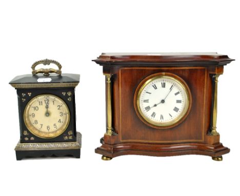 An Edwardian mahogany and line inlaid mantel clock of serpentine form with Roman numerals, height 20cm and an ebonised carria