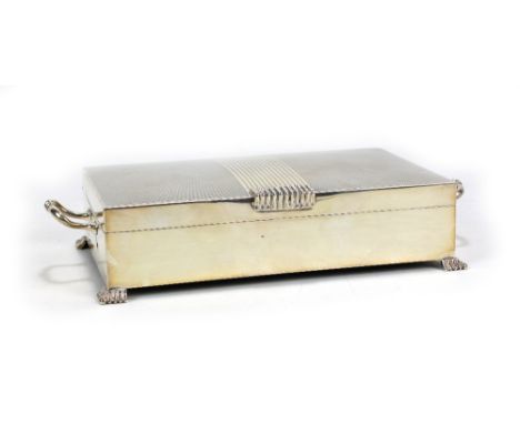 CHARLES S GREEN &amp; CO LTD; an Elizabeth II hallmarked silver twin handled two division cigarette box with reeded and engin