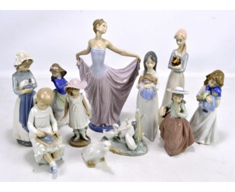 NAO; nine Nao figures to include a girl with a puppy, a girl with a chalk board and girl with basket of flowers (one boxed), 