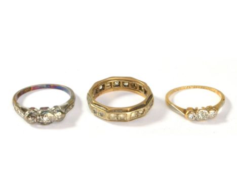 An 18ct gold and three stone illusion set diamond ring, size K, a further 18ct ring set with white stones (af) and a 9ct gold