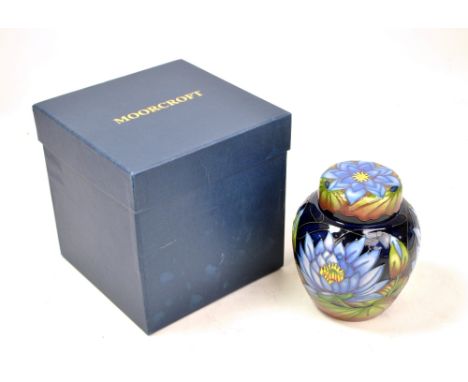 MOORCROFT; a Trial 'Blue Lotus' pattern tubeline decorated lidded ginger jar, monogram, date 7/5/09 and impressed marks with 
