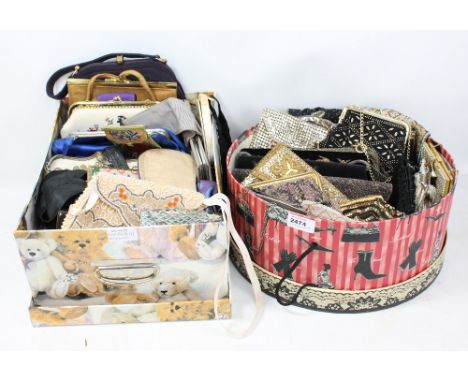 A group of vintage evening bags including bead example, sequinned example, white metal example, embroidered examples, etc.
