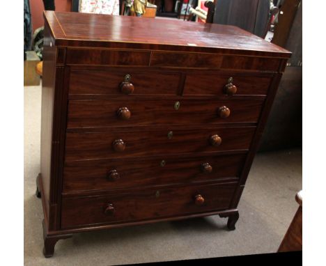 A large 19th century mahogany chest of two short and four long drawers raised on bracket feet.