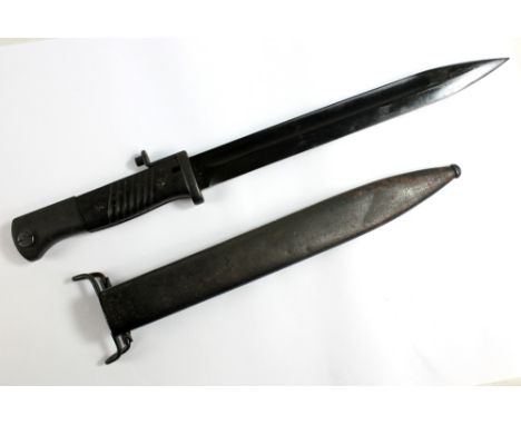 A Mauser bayonet M/84/98 stamped to blade base 'Elite-Diamant' and numbered 8307, blade length 25cm, with chequered grip in m