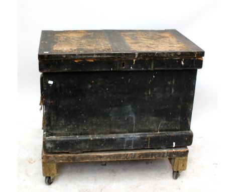 A large late Victorian black painted pine tool chest with hinged lid (hinge af) enclosing fitted mahogany interior with conte