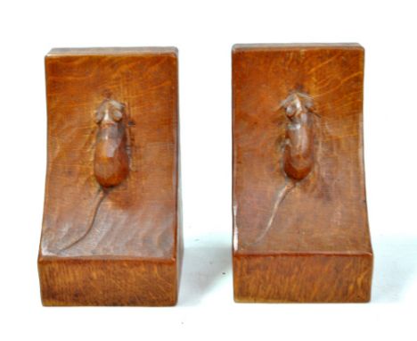 MOUSEMAN; a pair of Robert Thompson of Kilburn adzed oak book ends, each with mouse signature and of good colour, height 16.2