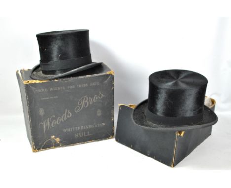 A vintage Tress &amp; Co of London for Woods Bros silk top hat and another similar, internal width 20 x 16cm to both (2).