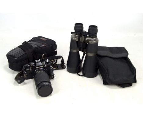 A pair of Traveler 10-30 x 60 zoom binoculars and an Olympus OM10 camera and lens (2).&nbsp;