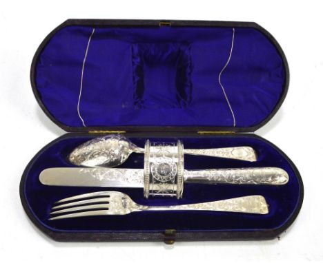 JOHN GILBERT; a cased Victorian hallmarked silver christening set comprising foliate engraved knife, fork and spoon, Birmingh