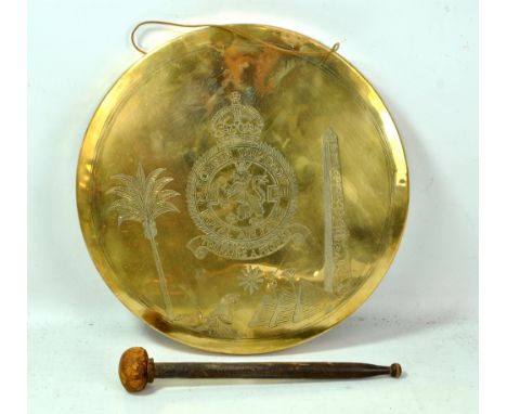 Squadron Leader S.H. Ware's engraved brass gong, '211 Bomber Squadron Royal Air Force' with Egyptian motifs around the centra