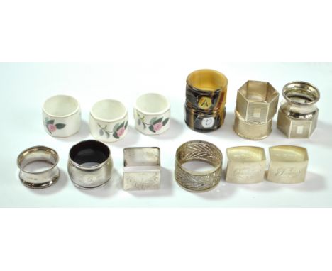 A group of variously hallmarked silver napkin rings including two pairs with one inscribed 'James' and 'Geraldine', approx 6.