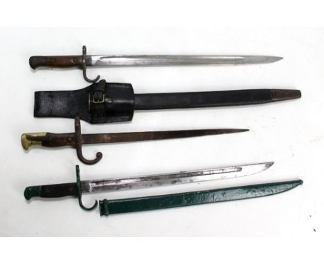 Three bayonets including British military issue example dated 1907 and further stamped to blade base 'EFD', blade length 43cm