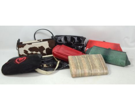 A group of bags comprising a Jaeger black patent leather clutch bag with part chain and leather strap, a Kurt Geiger faux fur