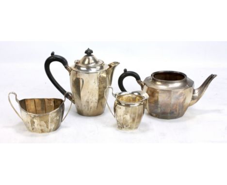 BARKER BROS SILVER &amp; CO; George V hallmarked silver four piece tea set of faceted form, Birmingham 1931, length of teapot