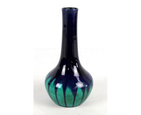 BURMANTOFTS; a navy and turquoise drip glazed bottle vase with impressed mark and no. 1535 to base, height 24cm (af).Addition