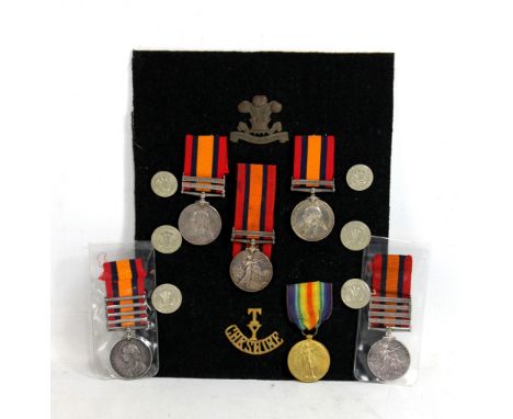 Five Queen's South Africa Medals awarded to the 21st and 22nd (Cheshire) Companies of the Imperial Yeomanry, the two four cla