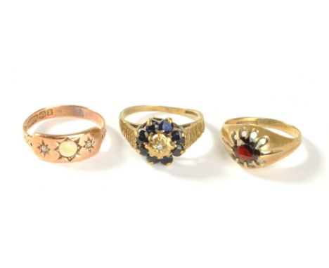 Three 9ct gold dress rings, one with opal cabochon flanked by diamond chips in starburst settings, size O, approx 6.1g (3).