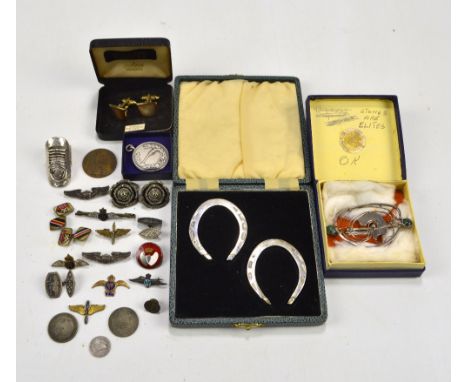 A small group of costume jewellery including stylised Scottish silver brooch set with two green stone cabochons, cased pair o