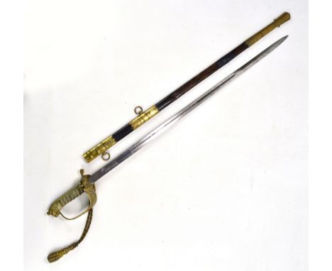 WILKINSON SWORD LONDON; an Elizabeth II Regulation Royal Navy officer's dress sword with royal cipher to one side and fouled 