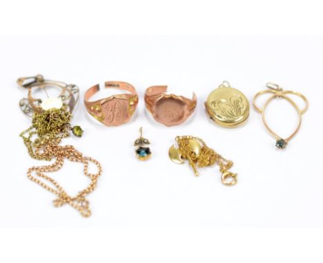 A mixed lot of jewellery including a 9ct yellow gold ring (cut), two pendants, chains, a further cut ring, etc.