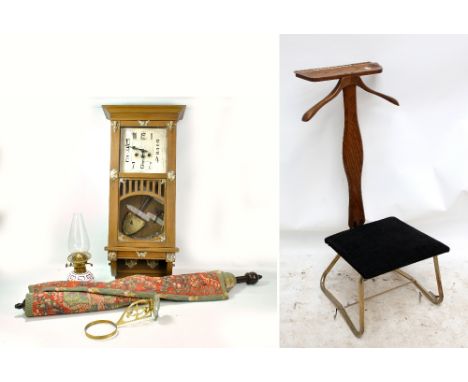 A Secessionist style oak wall clock, the square dial set with Arabic numerals, with applied silvered metal ornaments, height 