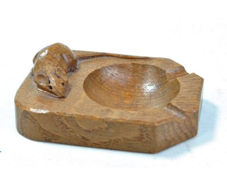 MOUSEMAN; a Robert Thompson of Kilburn oak ashtray with mouse signature, length 10.25cm.