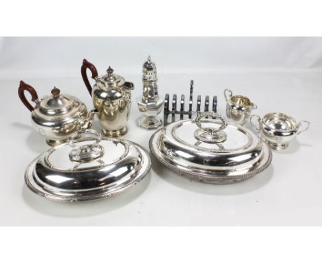 ADIE BROS LTD; a George V hallmarked silver four piece tea set comprising circular teapot, length 27cm, hot water pot, twin h