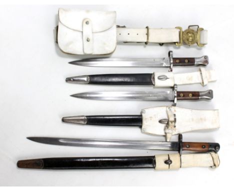 Three British bayonets with two military issue examples, the first stamped Wilkinson and dated 1907 and the second stamped Sa