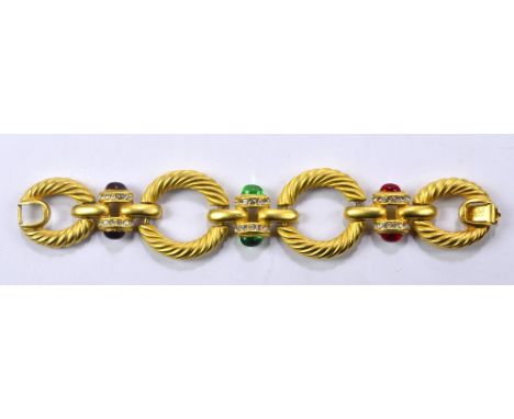 CIRO; a vintage gilt metal fancy rope twist link bracelet set with three pairs of variously coloured cabochons within cubic z