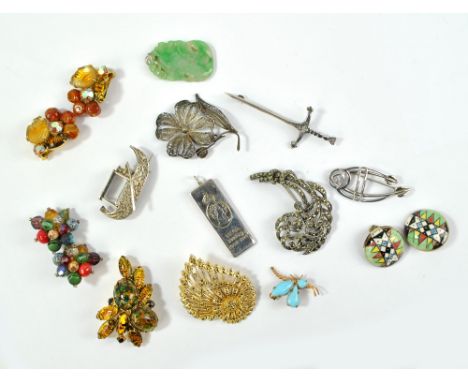 A small group of costume jewellery to include a hallmarked silver brooch in the style of Charles Rennie Mackintosh, a Celtic 