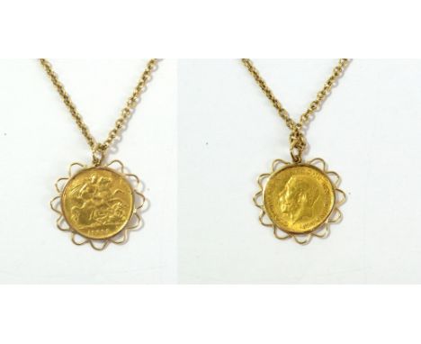 A George V half sovereign, 1913, in 9ct gold mount and suspended on yellow metal chain stamped 9ct to clasp, approx 11.0g.
