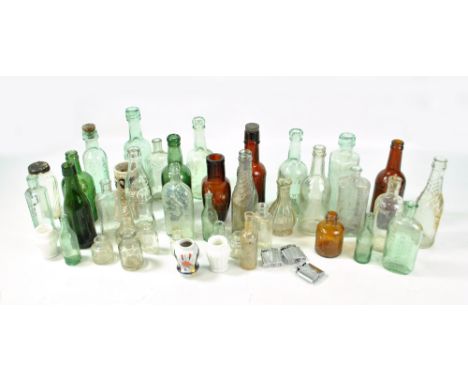 A group of vintage glass bottles including chemist examples.&nbsp;