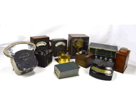 A group of scientific instruments including General Electric Company voltmeter, Hunts Capacitance and Resistance analyser, H.