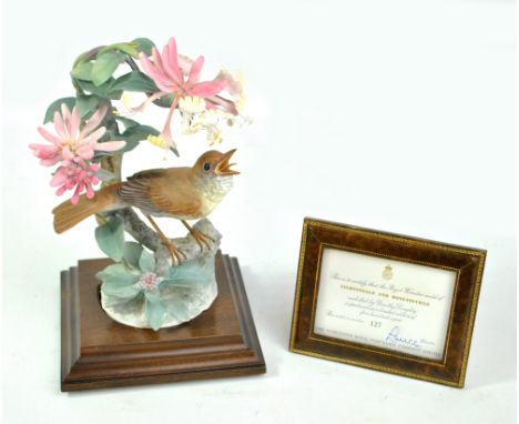 ROYAL WORCESTER; a limited edition 'Nightingale and Honeysuckle' bird model, modelled by Dorothy Doughty, no. 127/500 with ce