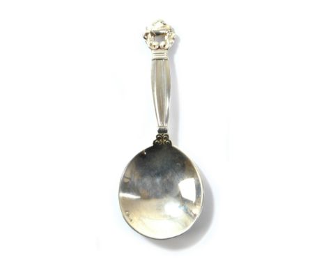 GEORG JENSEN; a Danish sterling silver 'Acorn' pattern caddy spoon with circular bowl, bearing 1933-1944 maker's mark, length