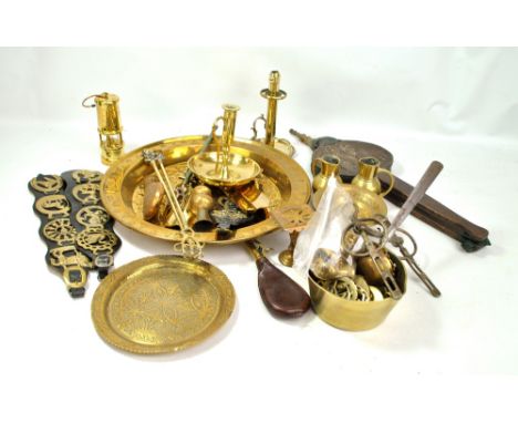 A mixed group of metalware including brass miner's safety lamp, chamber stick, dish, horse brasses, weights, etc.