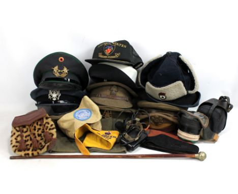 Three British Army caps with badges including Leeds Pals example, a Cheshire Regiment swagger stick with silver plated finial