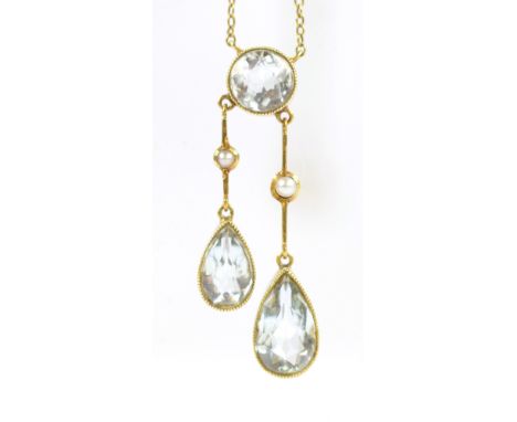 A 15ct yellow gold aquamarine and seed pearl pendant suspended on a 9ct yellow gold fine link chain, length of drop approx 4c