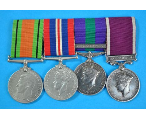 A WWII and later medal group of four comprising WWII War and Defence Medals, General Service Medal with 'Palestine 1945-48' c