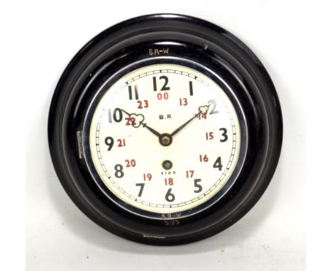 BRITISH RAILWAYS; a circular wall clock manufactured by Elliott of London, the circular dial set with Arabic numerals and sta